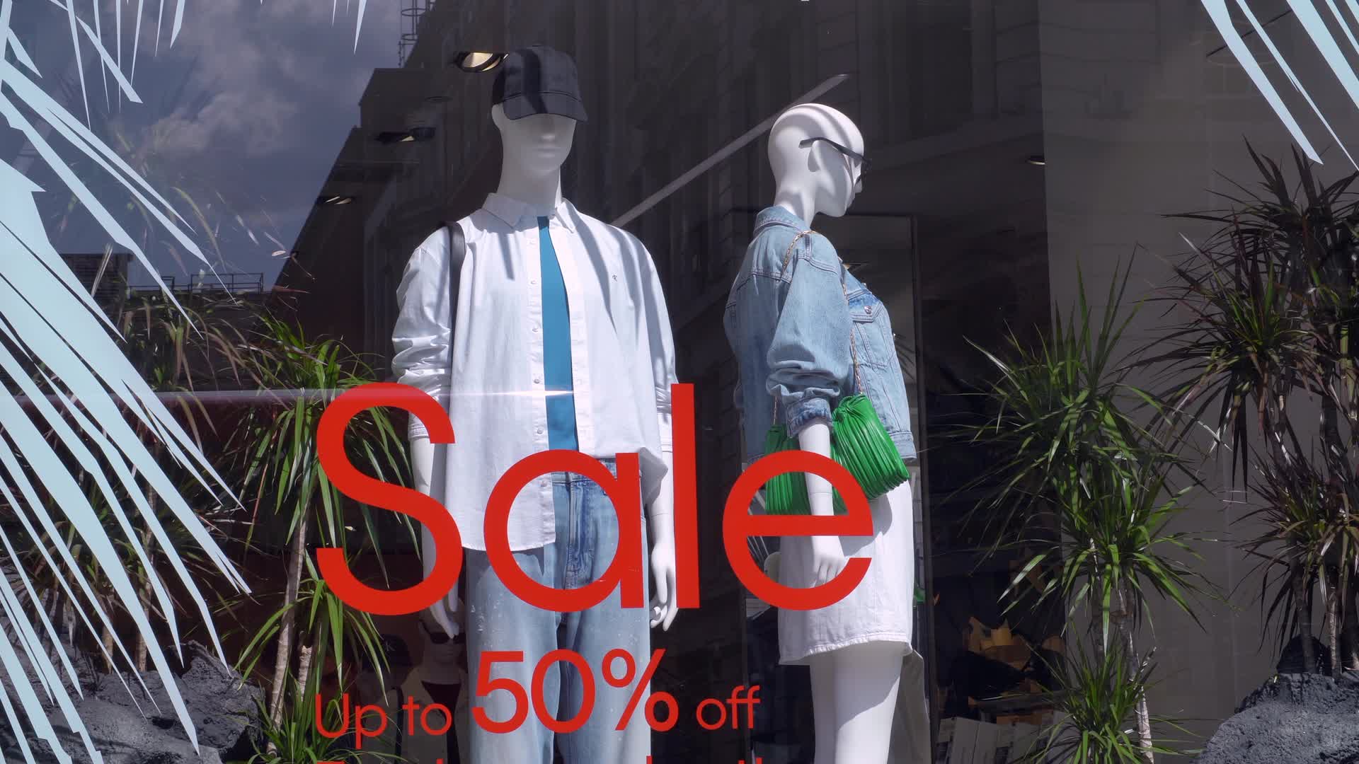 Storefront Sale Display with Mannequins and Calvin Klein Clothing