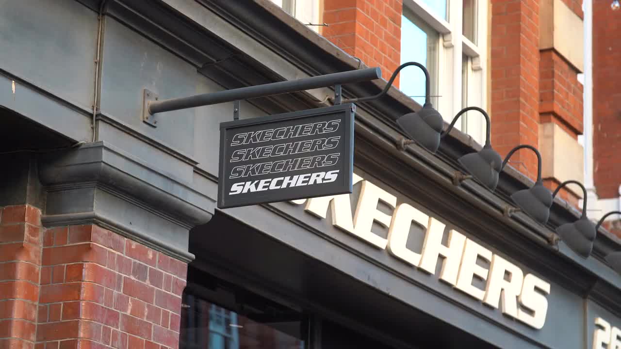 Skechers Storefront Sign in Urban Setting 4K