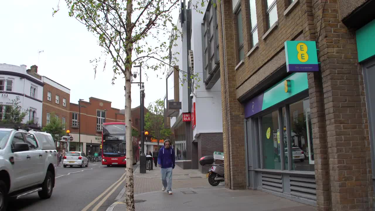 Urban Street Scene with EE Storefront