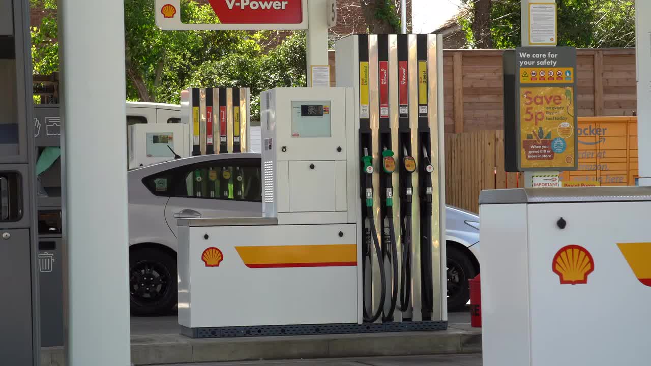 Modern Shell Gas Station with V-Power Fuel Pumps