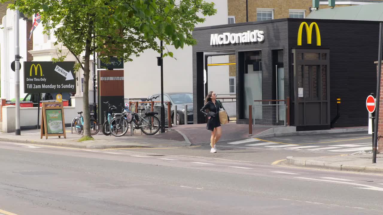 Urban McDonald's Drive-Thru and Pedestrian Scene in London