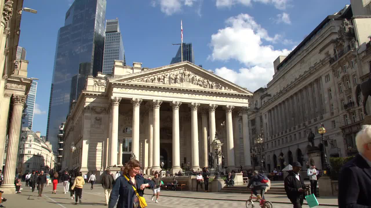 Bustling Scene at London's Royal Exchange on a Sunny Day