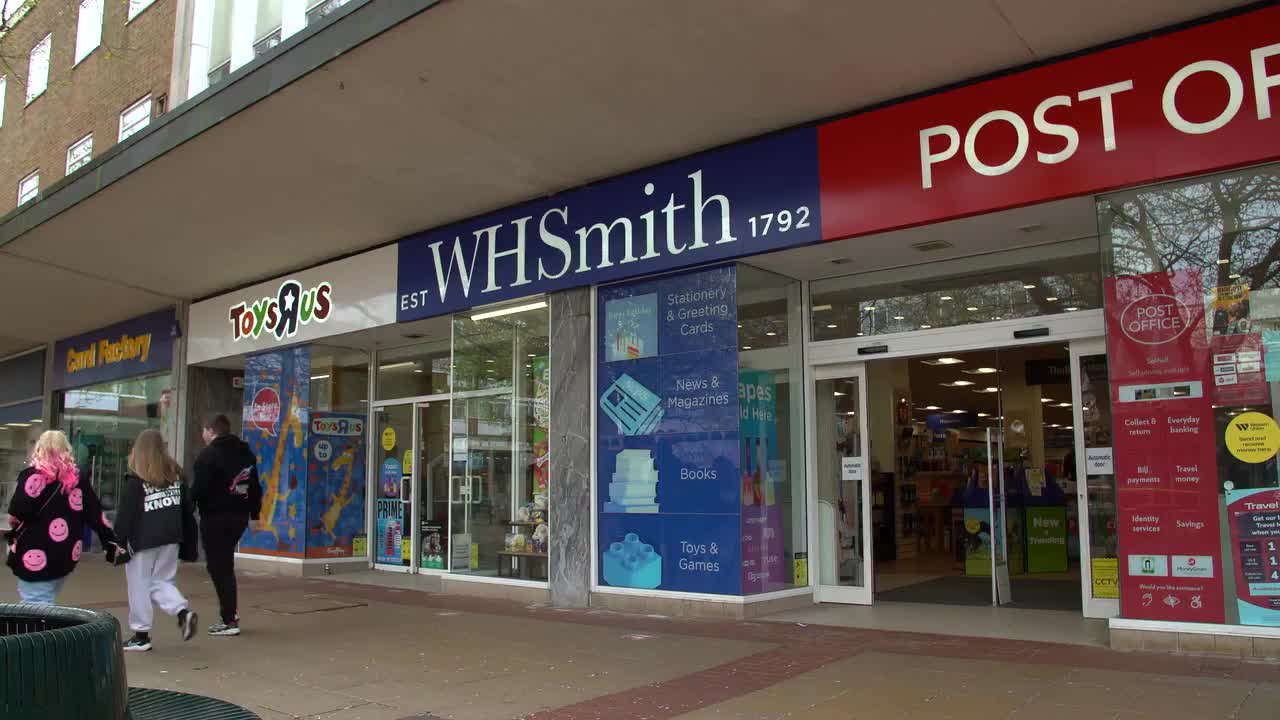 WHSmith Storefront and Entrance with Shoppers