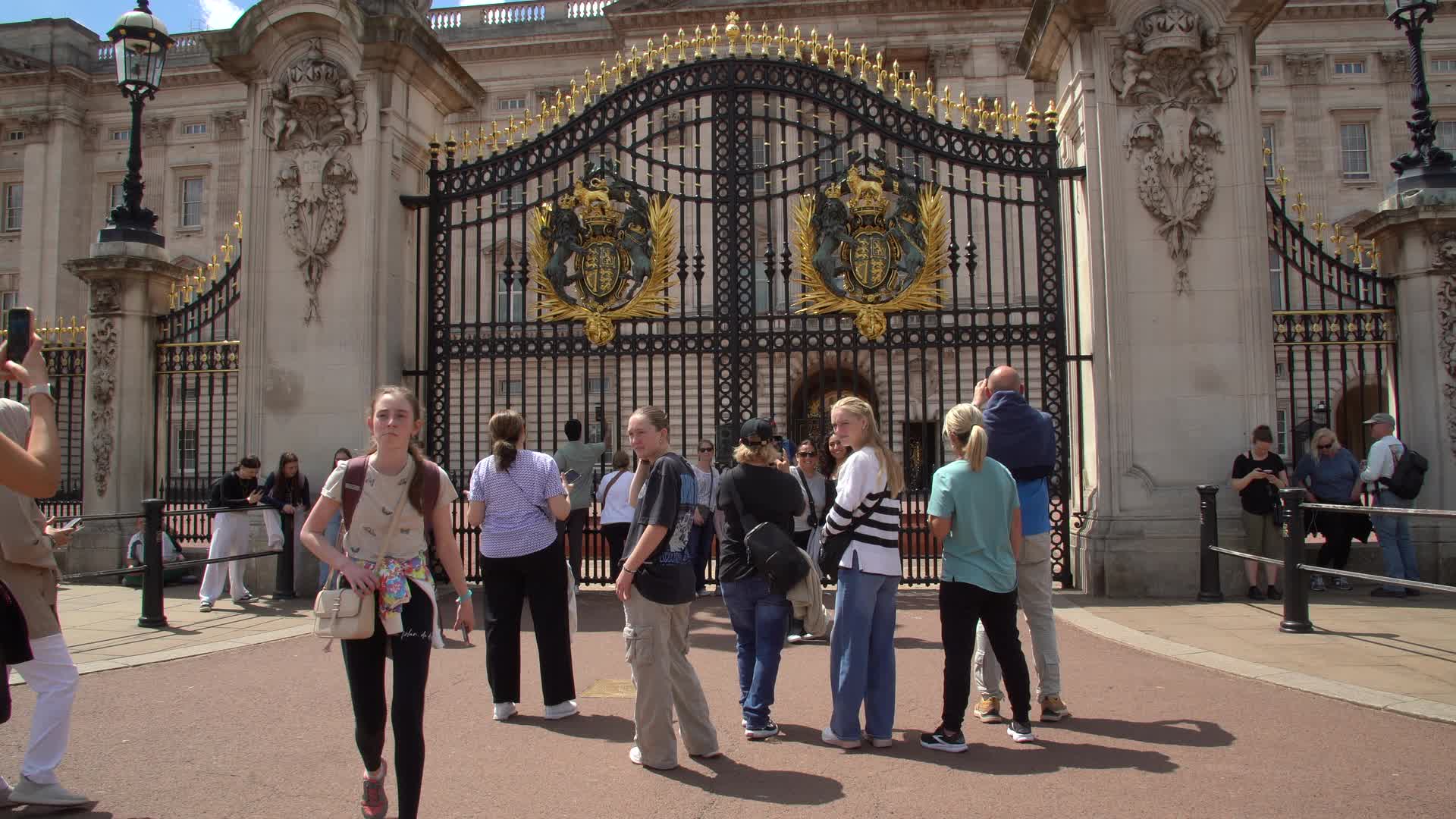 Crowds at Buckingham Palace Gates on a Sunny Day