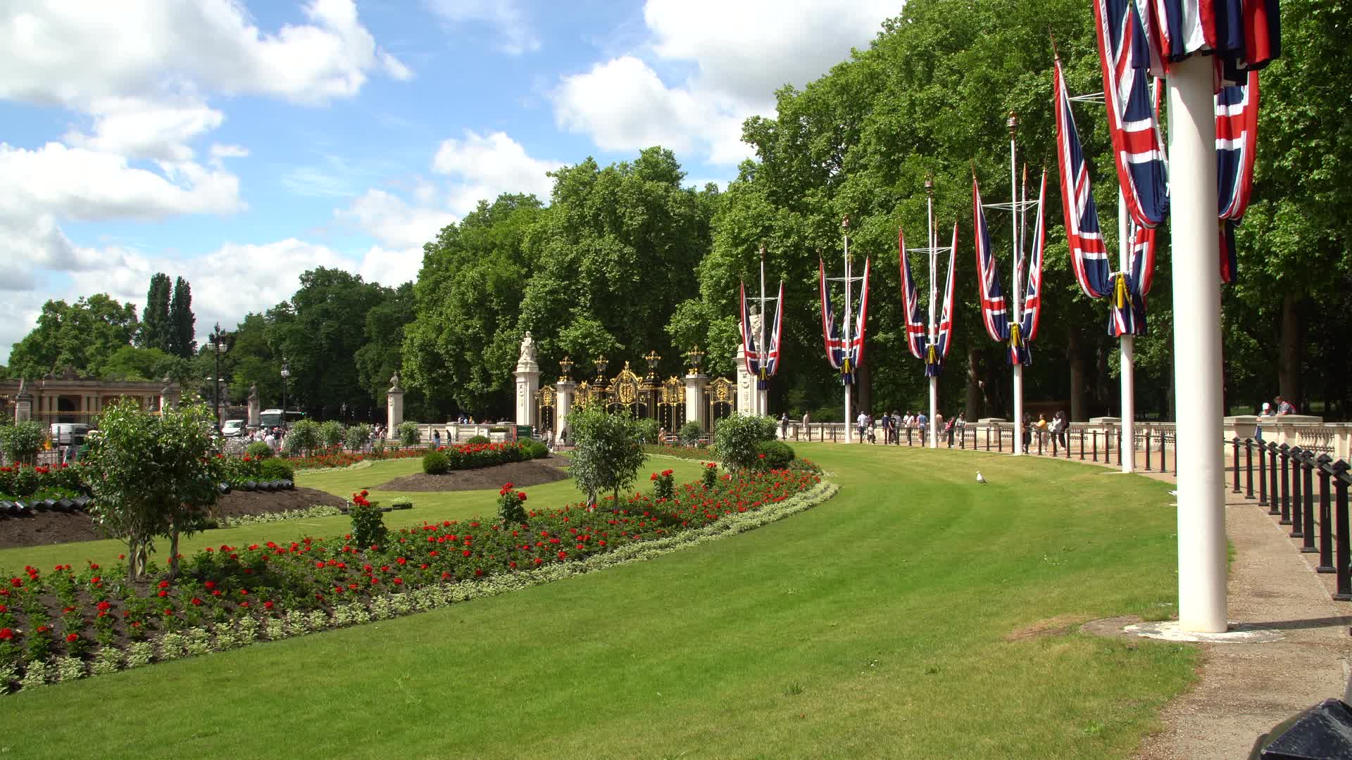 Buckingham Palace Gardens with Union Jack Flags