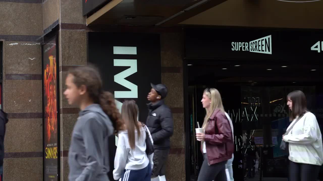 Busy Pedestrian Scene Outside Cineworld Cinema
