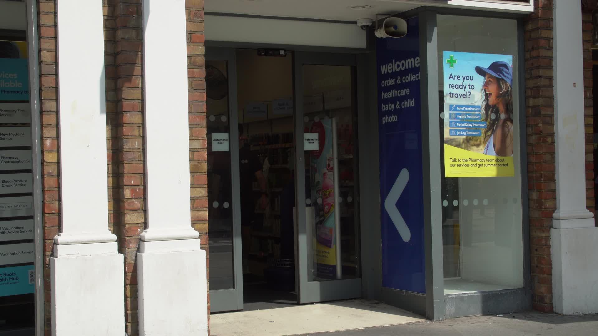 Entrance of Boots Pharmacy on a Sunny Day in London