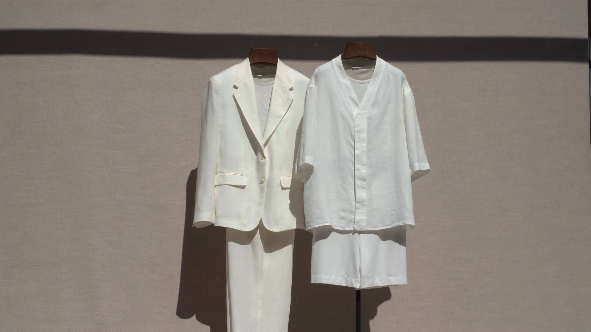 Elegant Minimalist White Outfit on Display