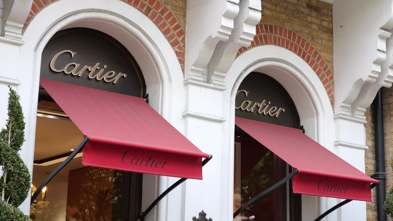 Cartier Storefront Exterior with Red Awnings