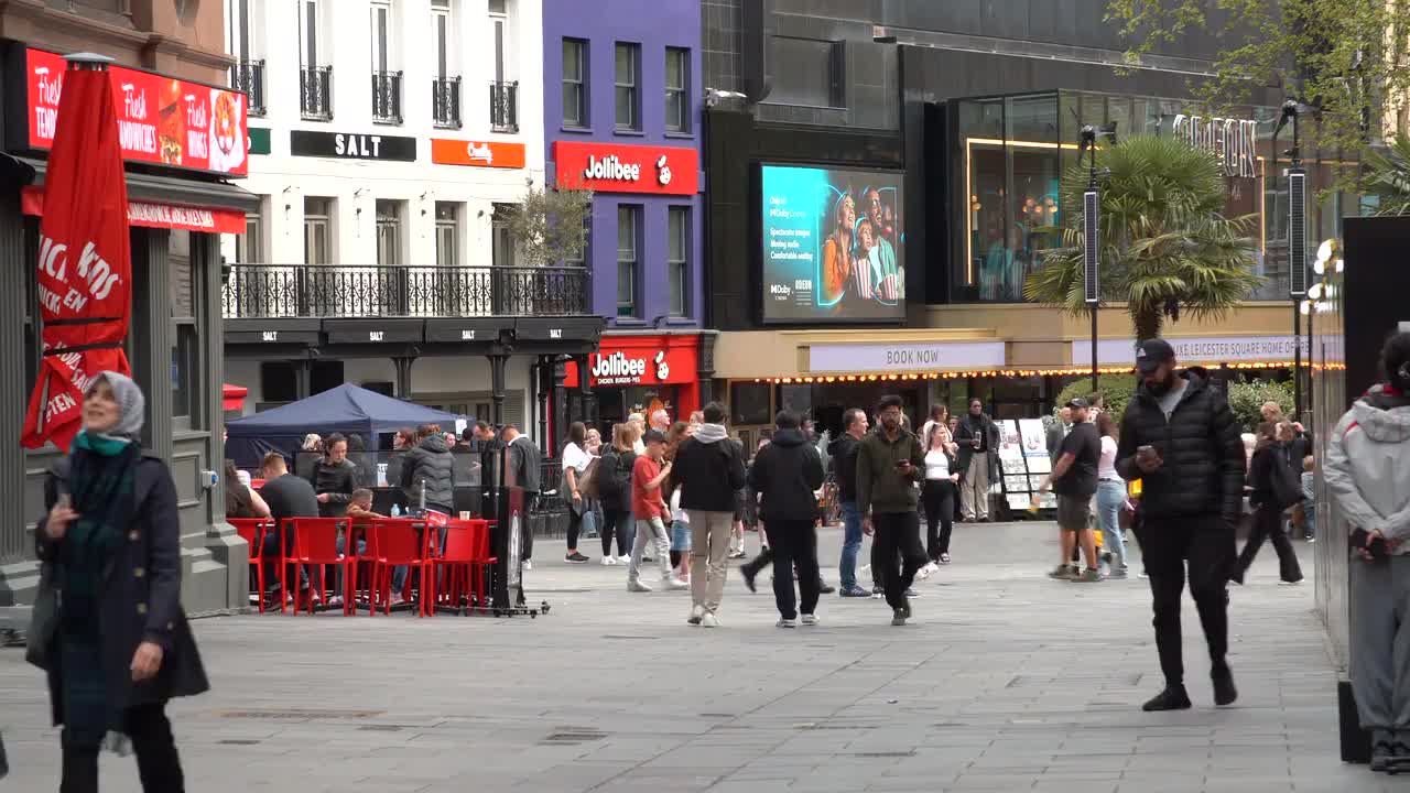 Bustling City Street Scene at Odeon