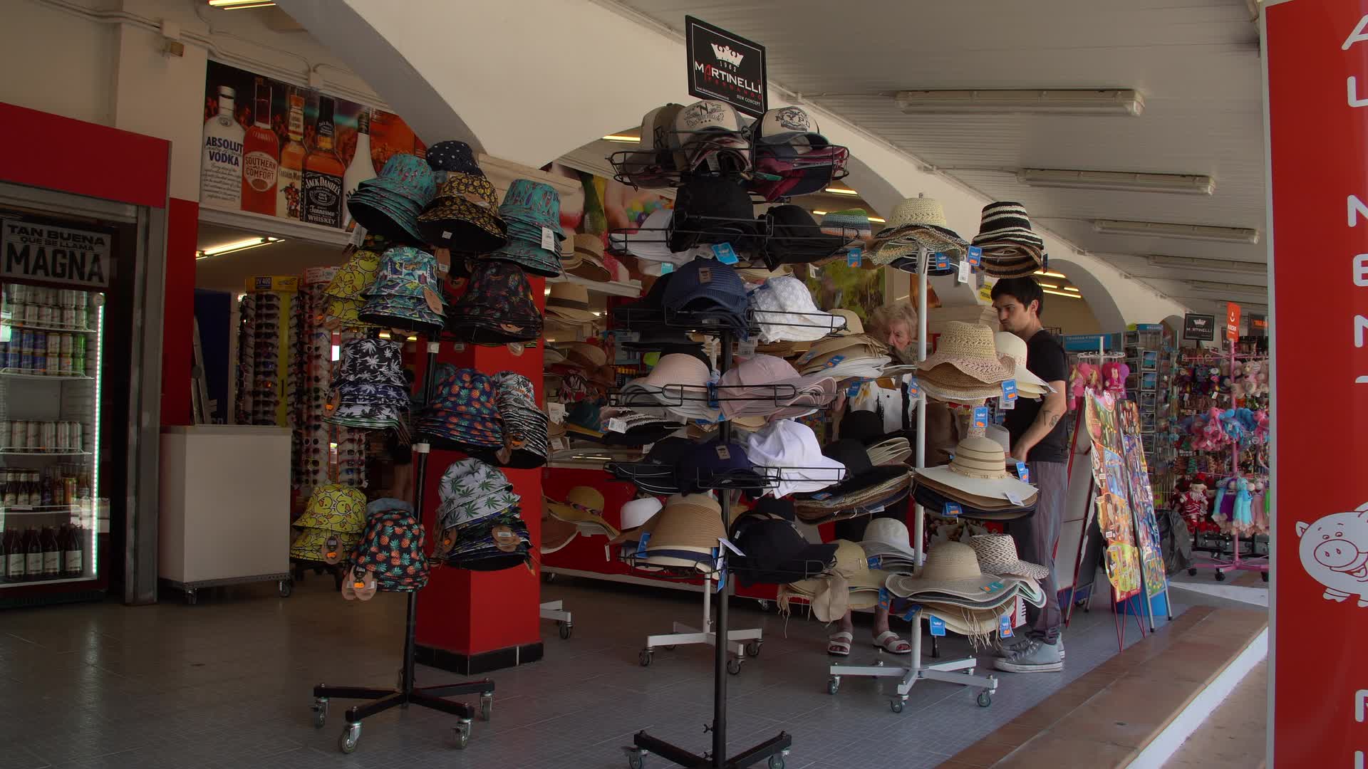 Outdoor Hat Display at SPAR Supermarket in Cala d'Or, Mallorca, Spain
