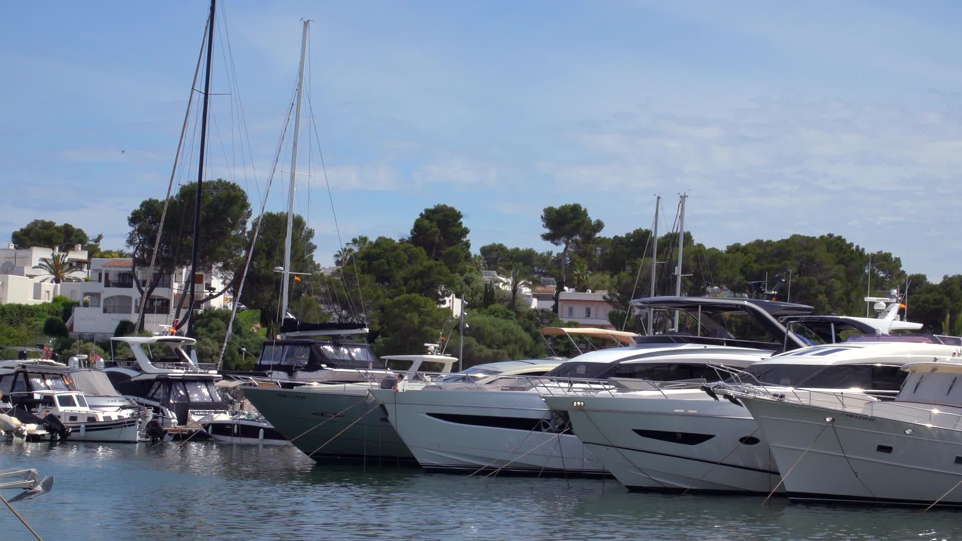 Luxury Yachts Moored in a Marina in Cala d'Or, Mallorca, Spain