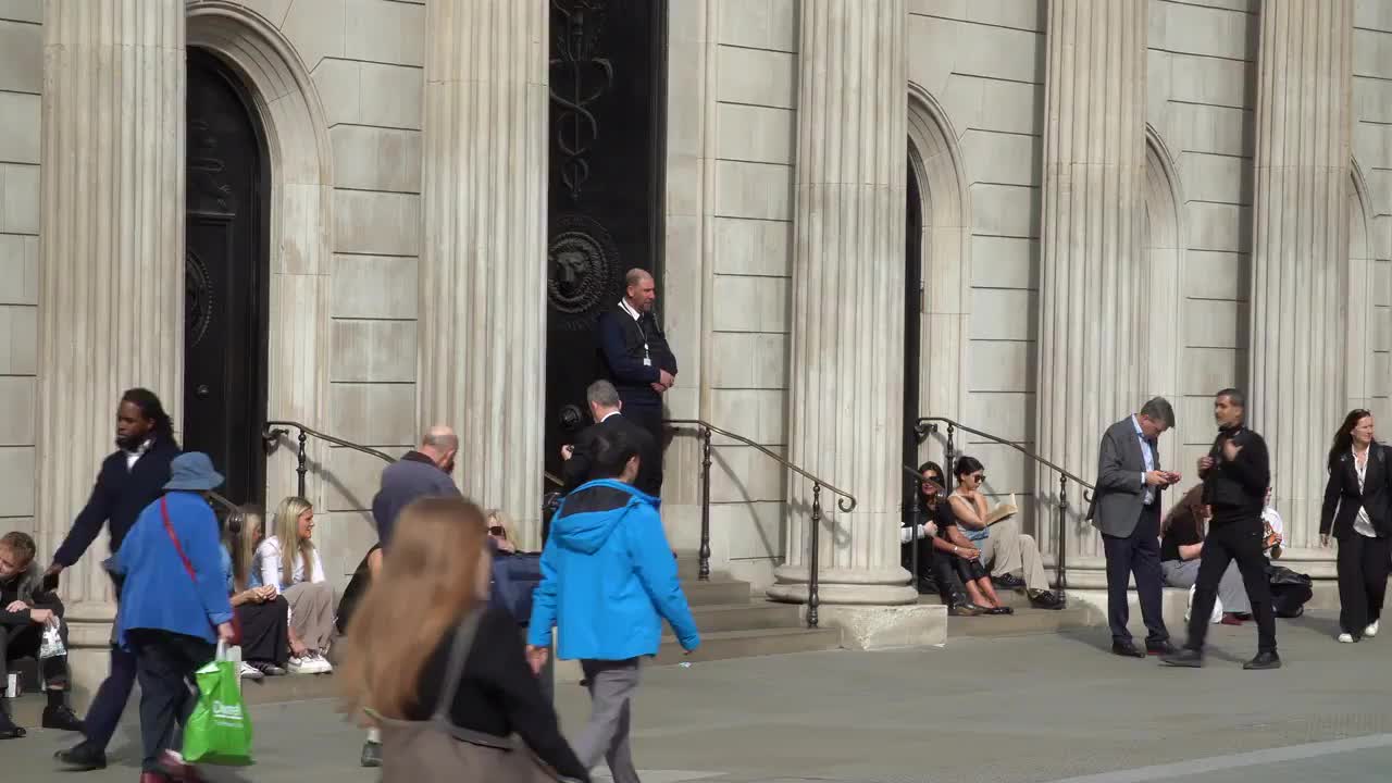 Crowds at the Bank of England Entrance in London