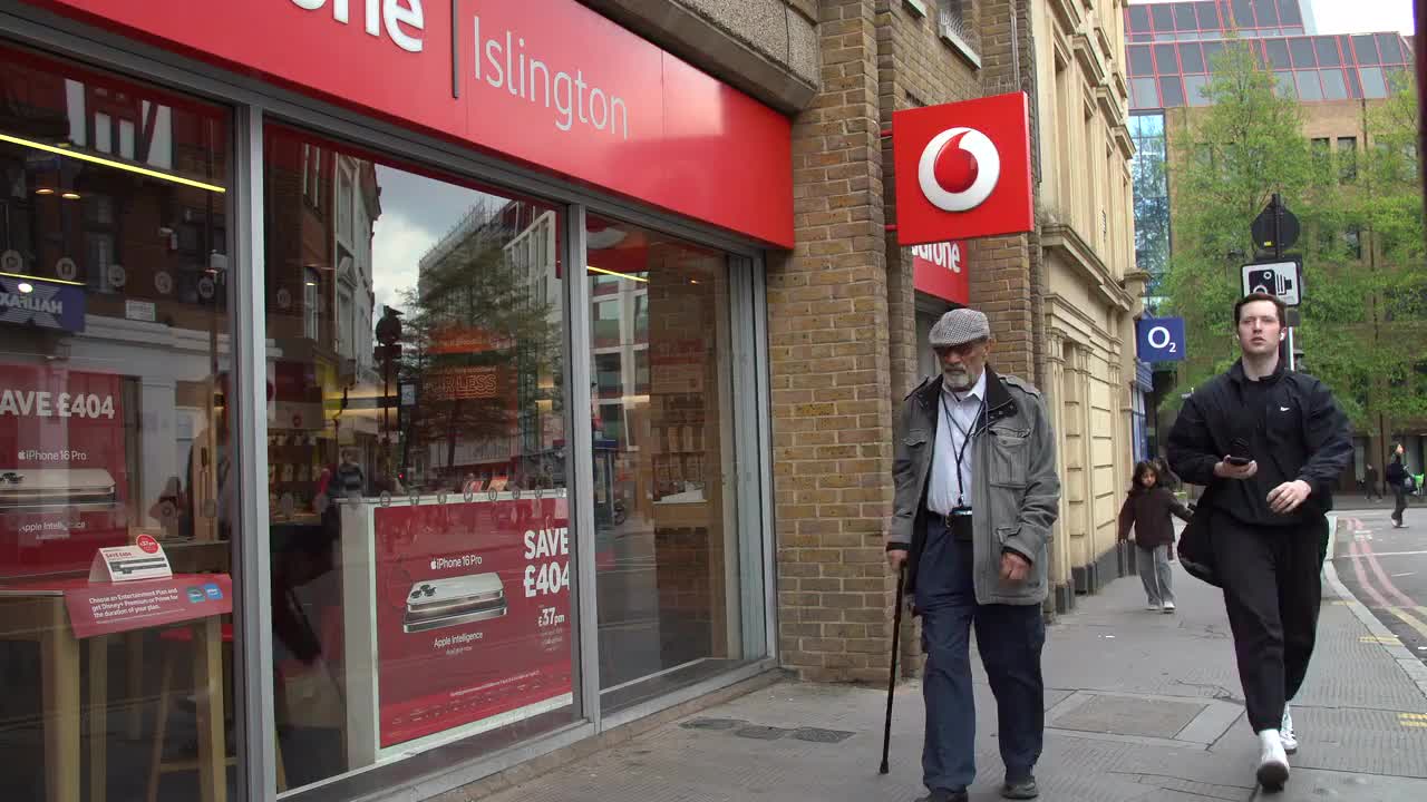 Urban Street Scene Outside Vodafone Store in Islington