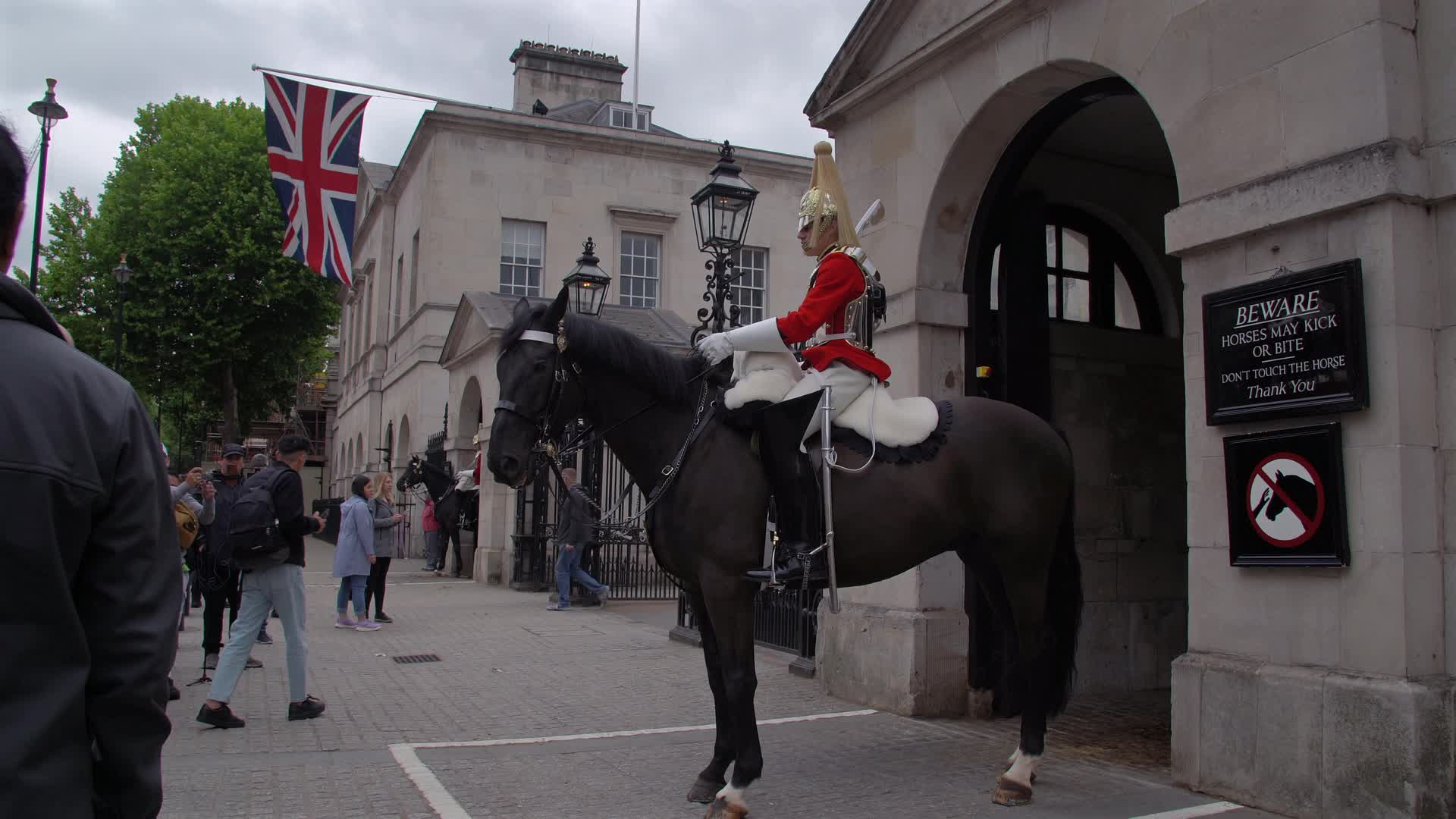 King's Guard on Horseback in London with Union Jack in Background