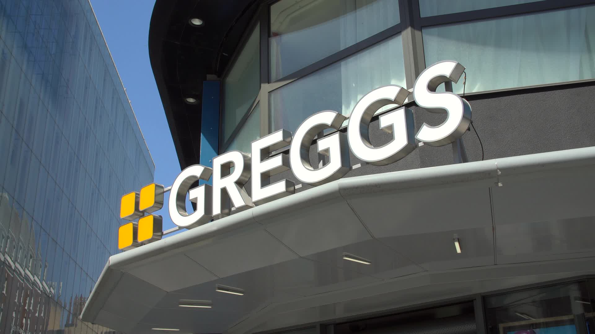 Urban Greggs Storefront on Sunny Day