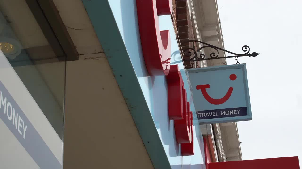 TUI Travel Money Sign on Urban Street
