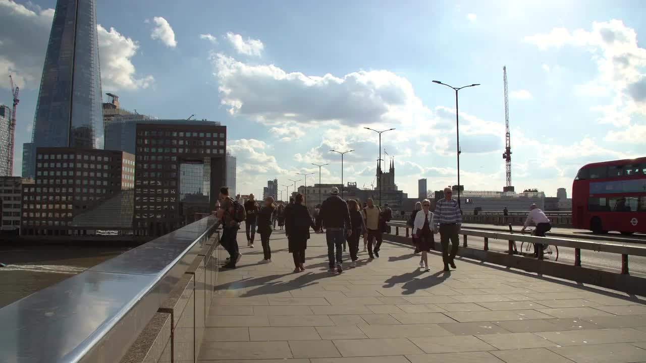 Busy Pedestrian and Cyclist Activity on London Bridge in 4K