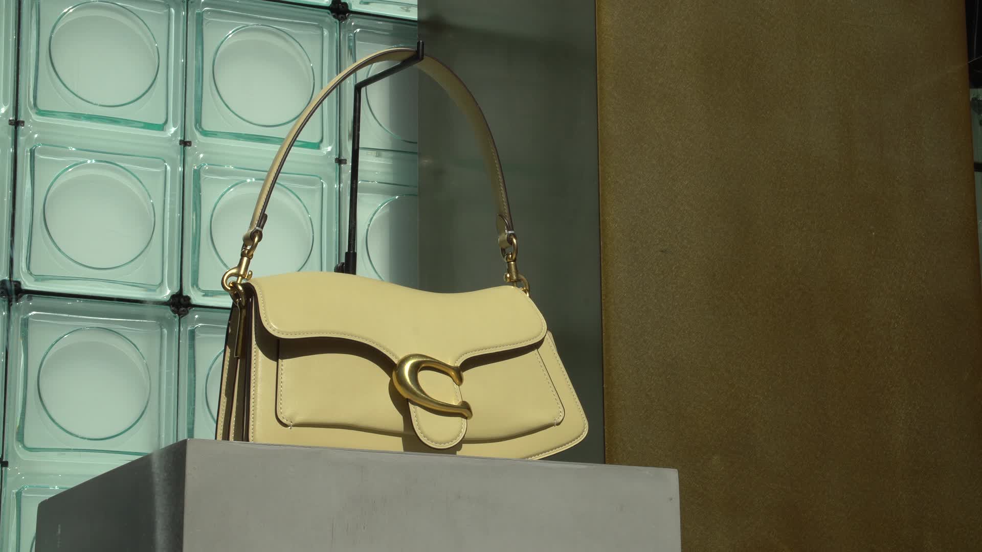 Elegant Designer Handbag on Display in Luxurious Setting