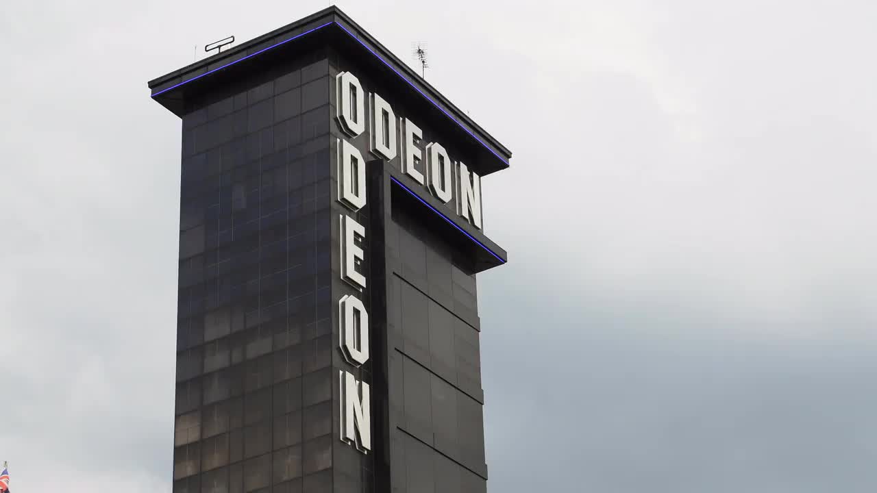 Odeon Cinema Tower Against Cloudy Sky