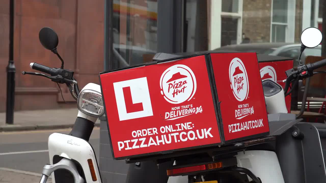 Pizza Hut Delivery Scooter in Urban Setting