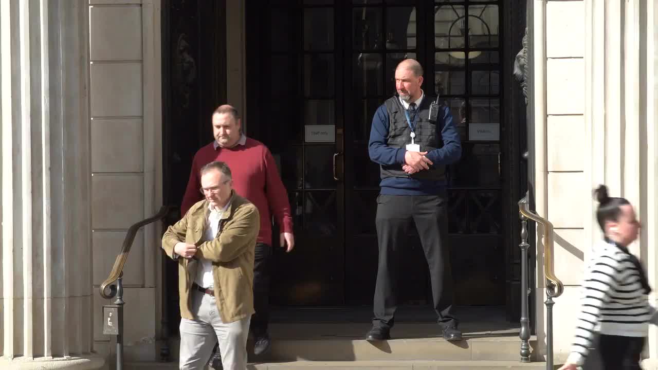 Bank of England Entrance with People Exiting - 4K