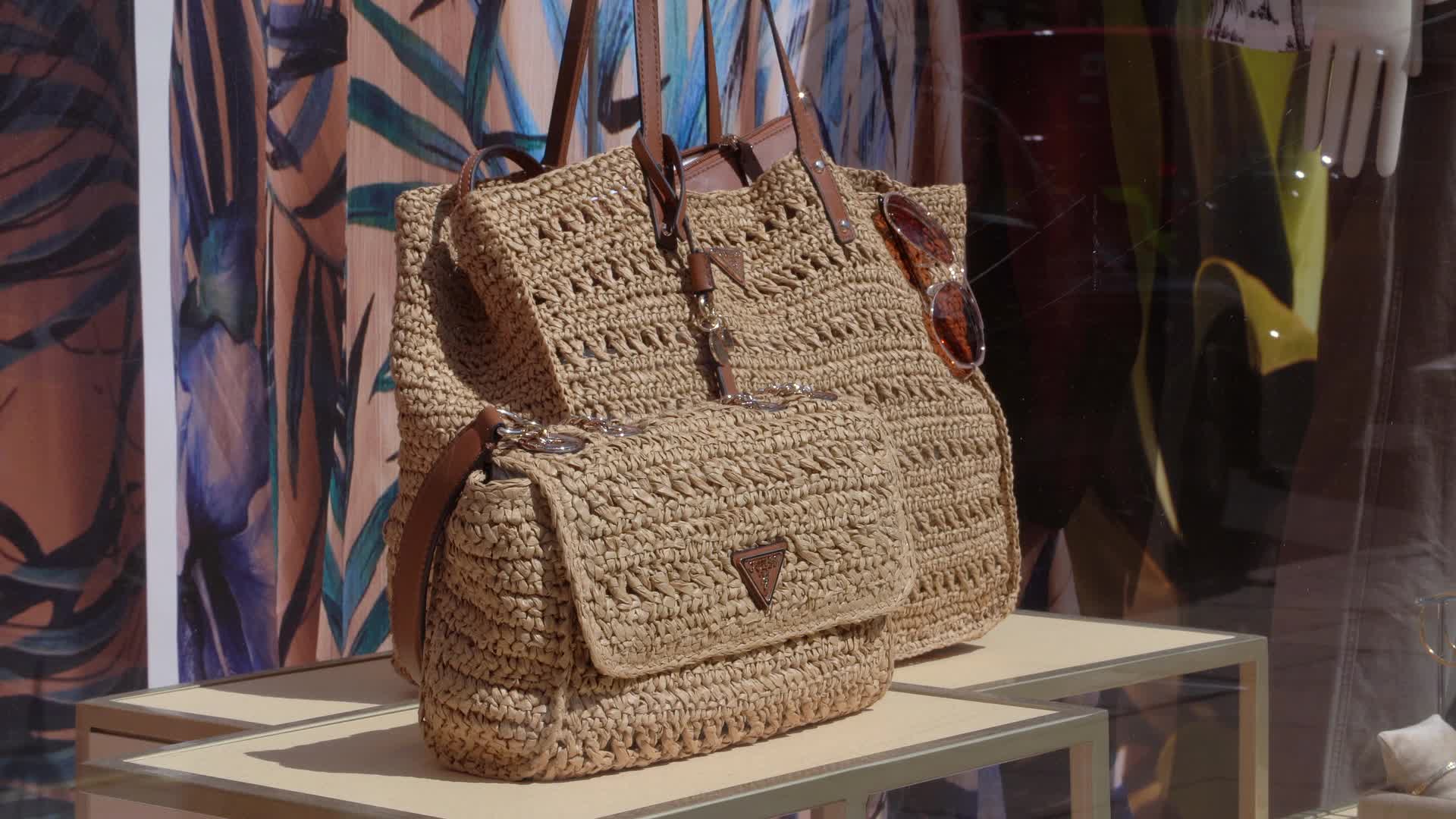 Designer Straw Handbags Display in Storefront