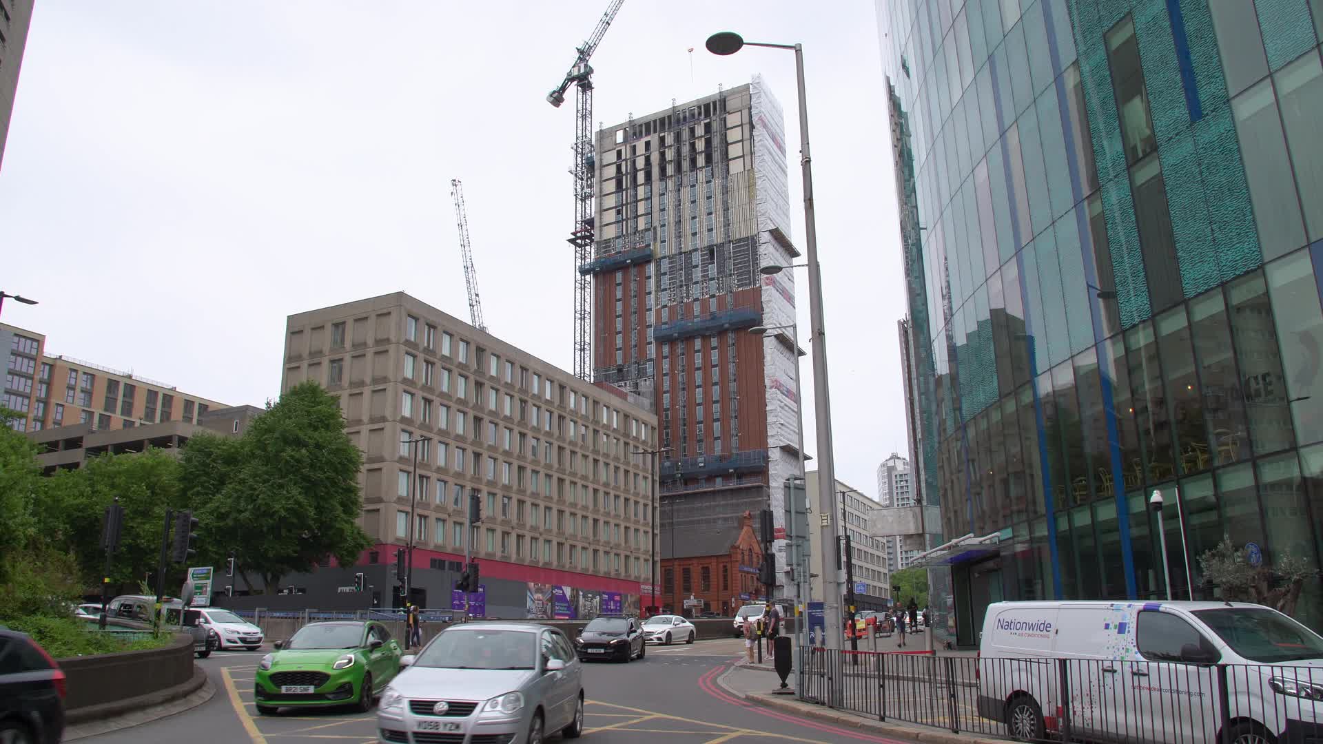 Construction Scene with Skyscrapers and Traffic in Birmingham City Centre
