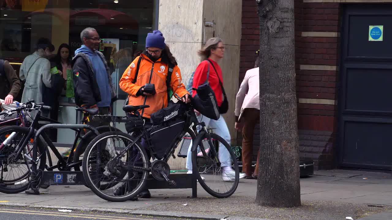 Urban Street Delivery Scene with Just Eat Cyclist
