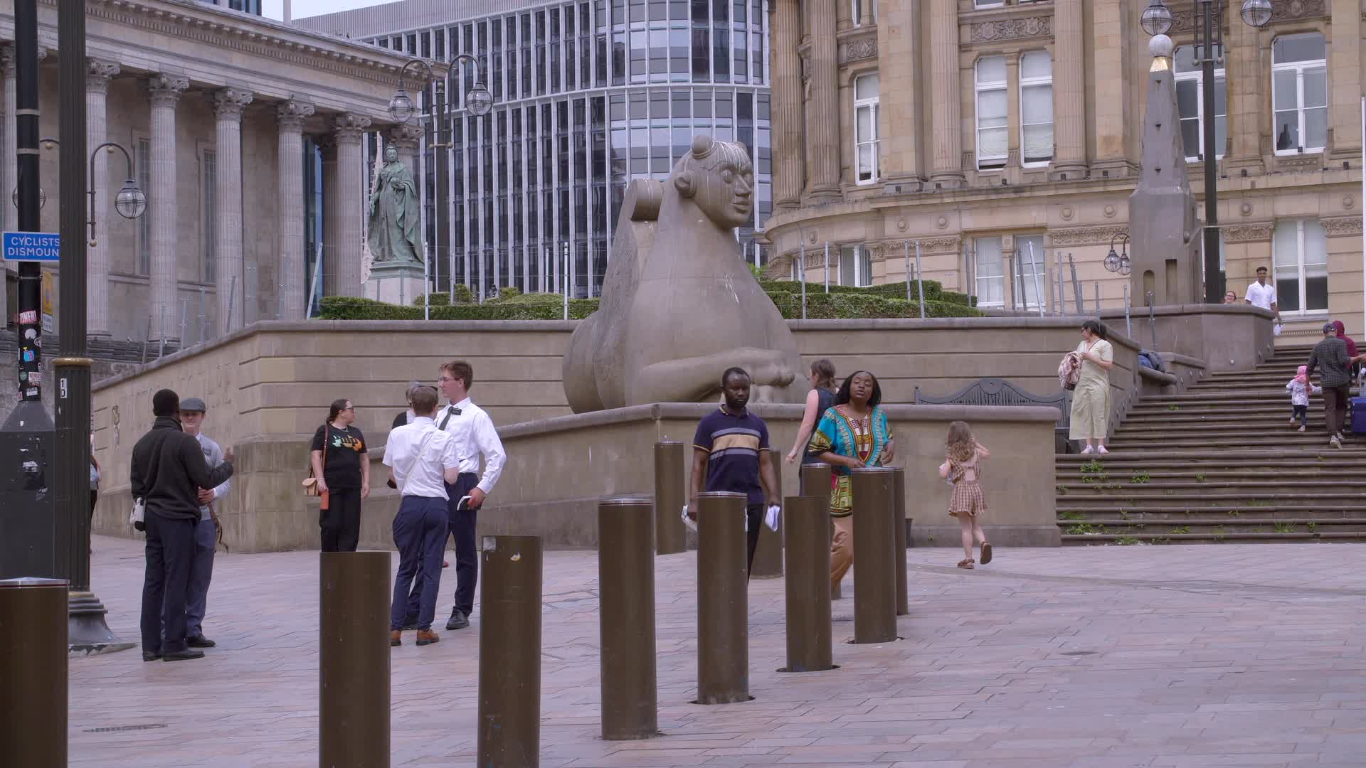 Birmingham Victoria Square with People and Statue