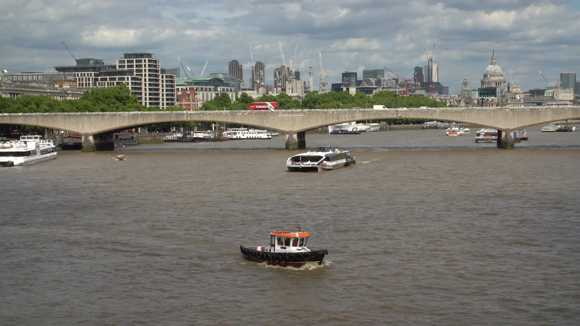 Thames River Scenery with Boats and Bridge in London