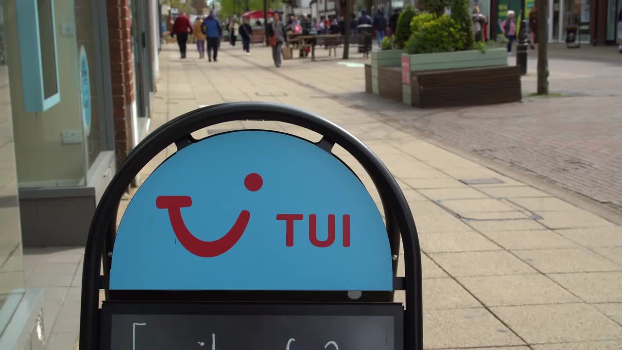 TUI Storefront and Pedestrian Street Scene