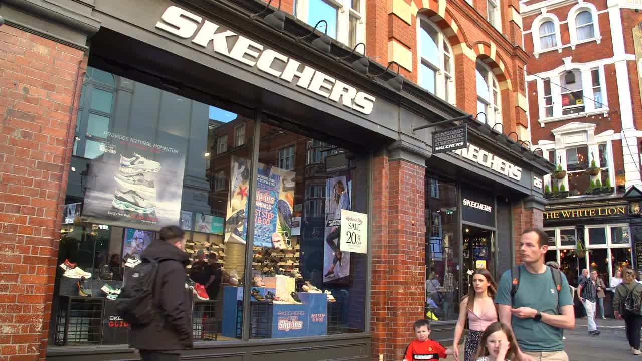 Skechers Storefront in Busy City Street 4K