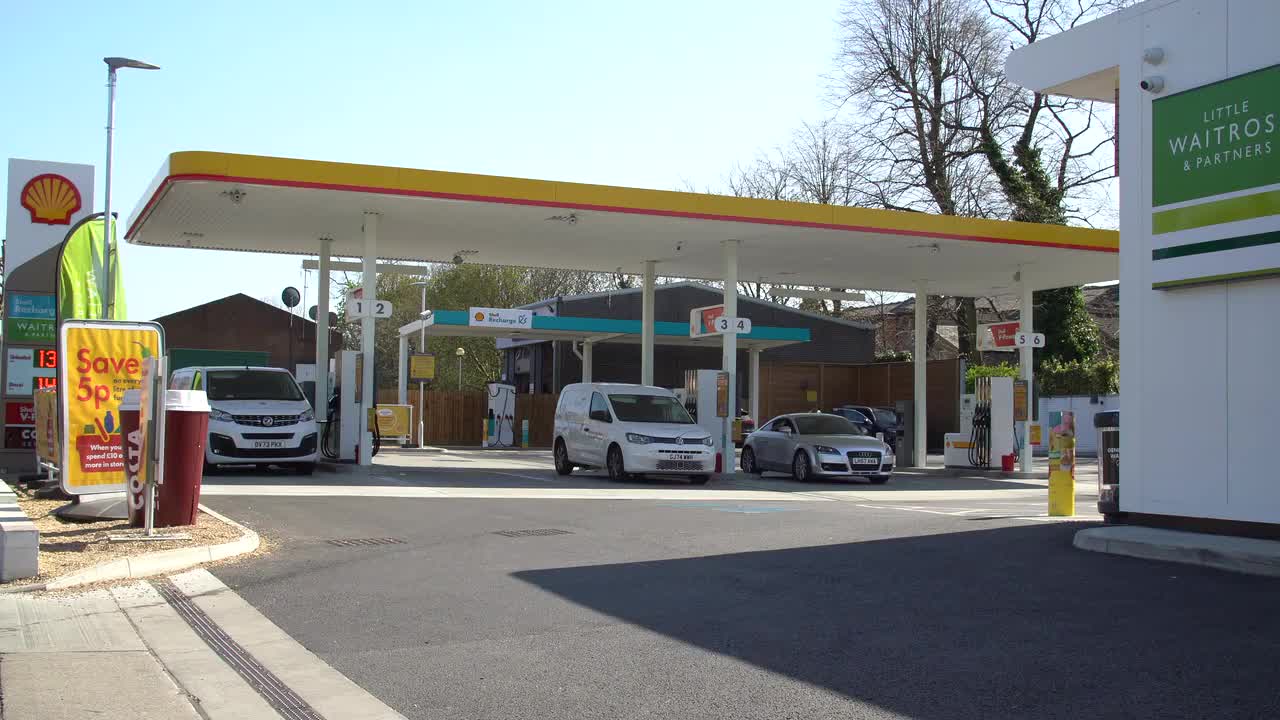Modern Shell Gas Station with Multiple Vehicles