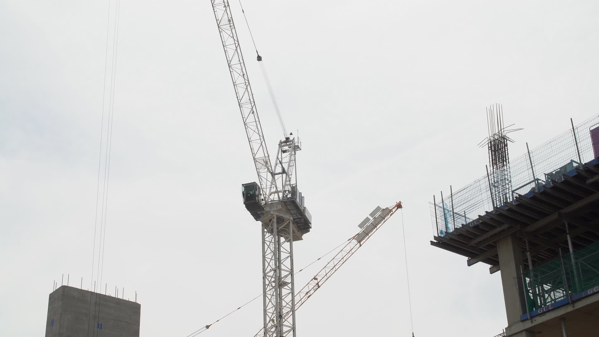 Construction Site Along Canal with Cranes in London