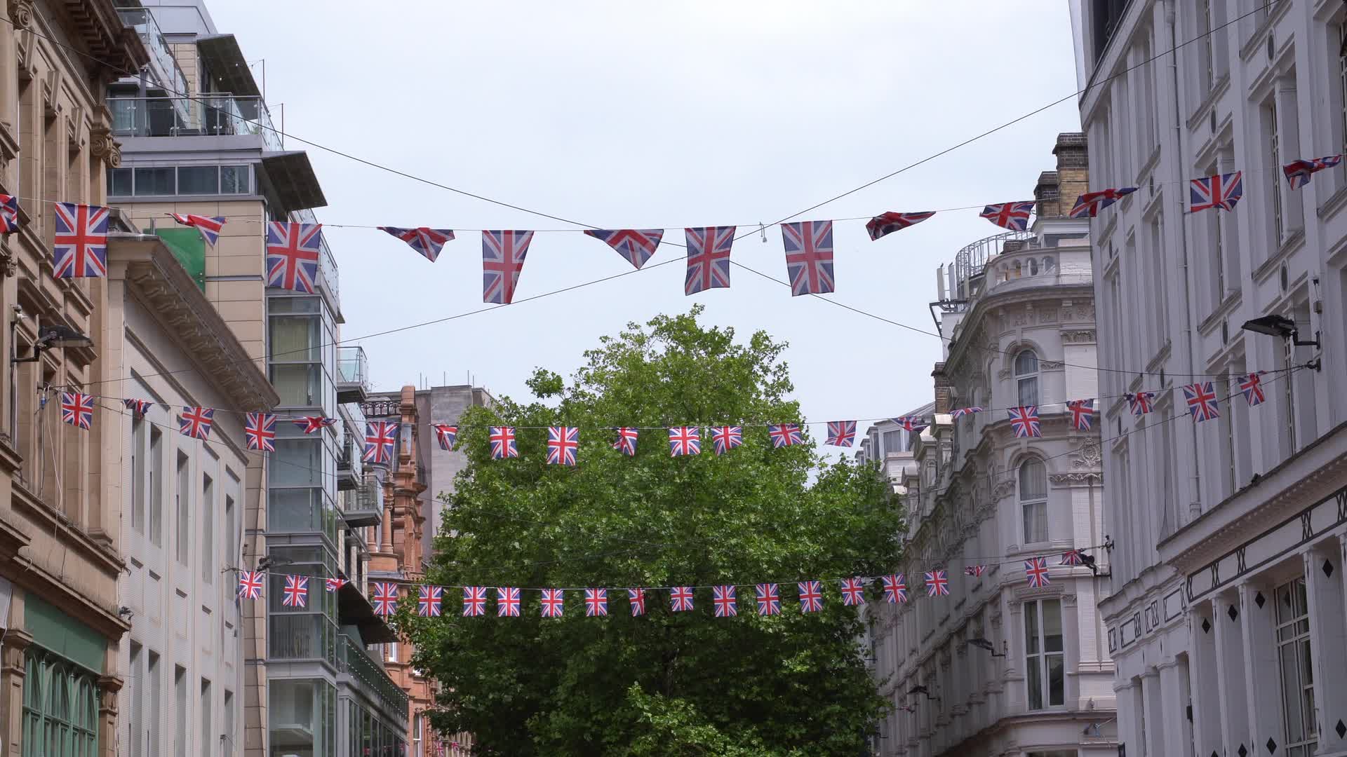 New Street in Birmingham Summer Shoppers Scene and Union Jack Flags