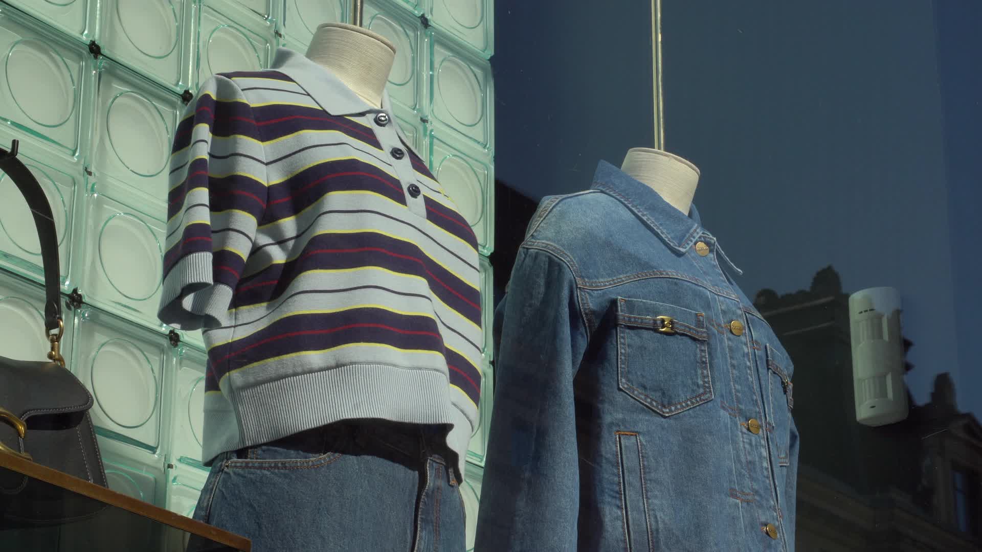 Coach Fashion Storefront Display with Denim and Striped Top on Regent Street, London