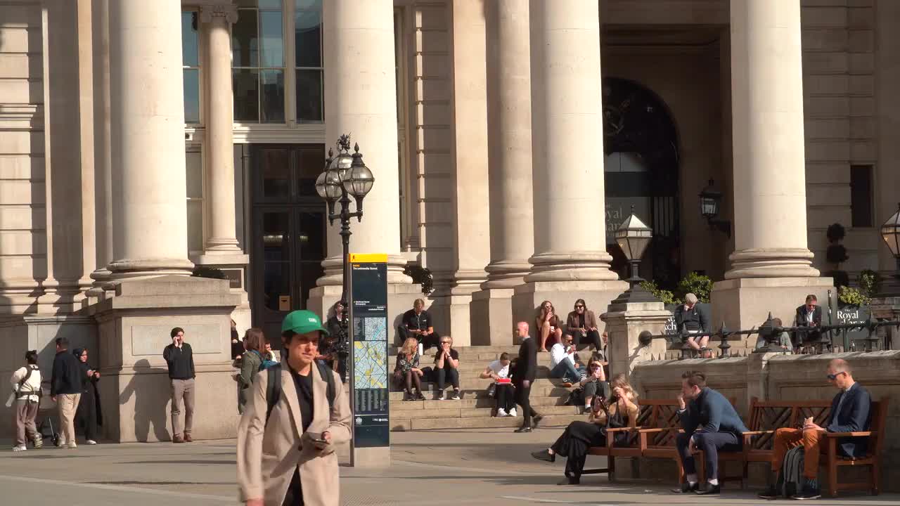 People Relaxing at the Royal Exchange in London 4K