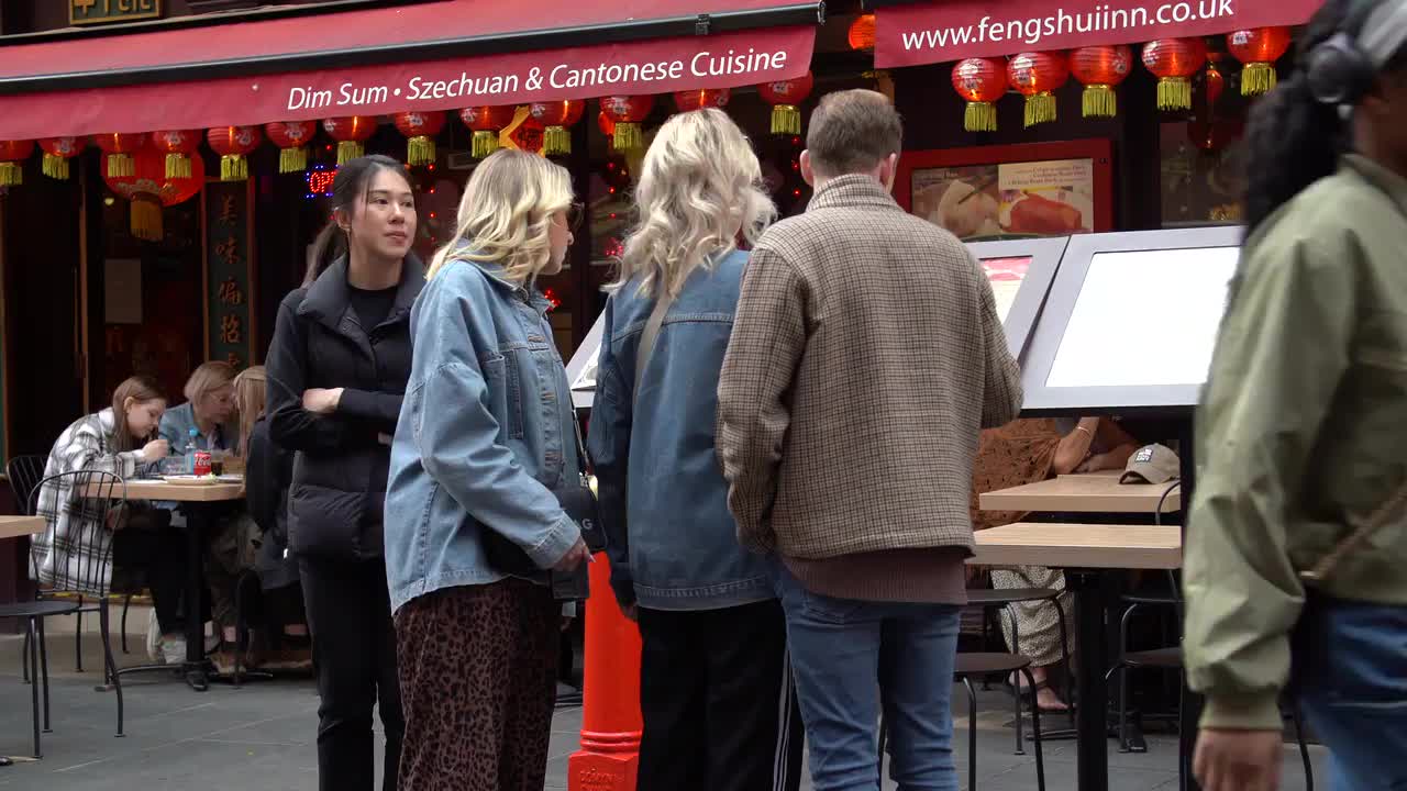 Tourists Exploring Soho Chinatown Area