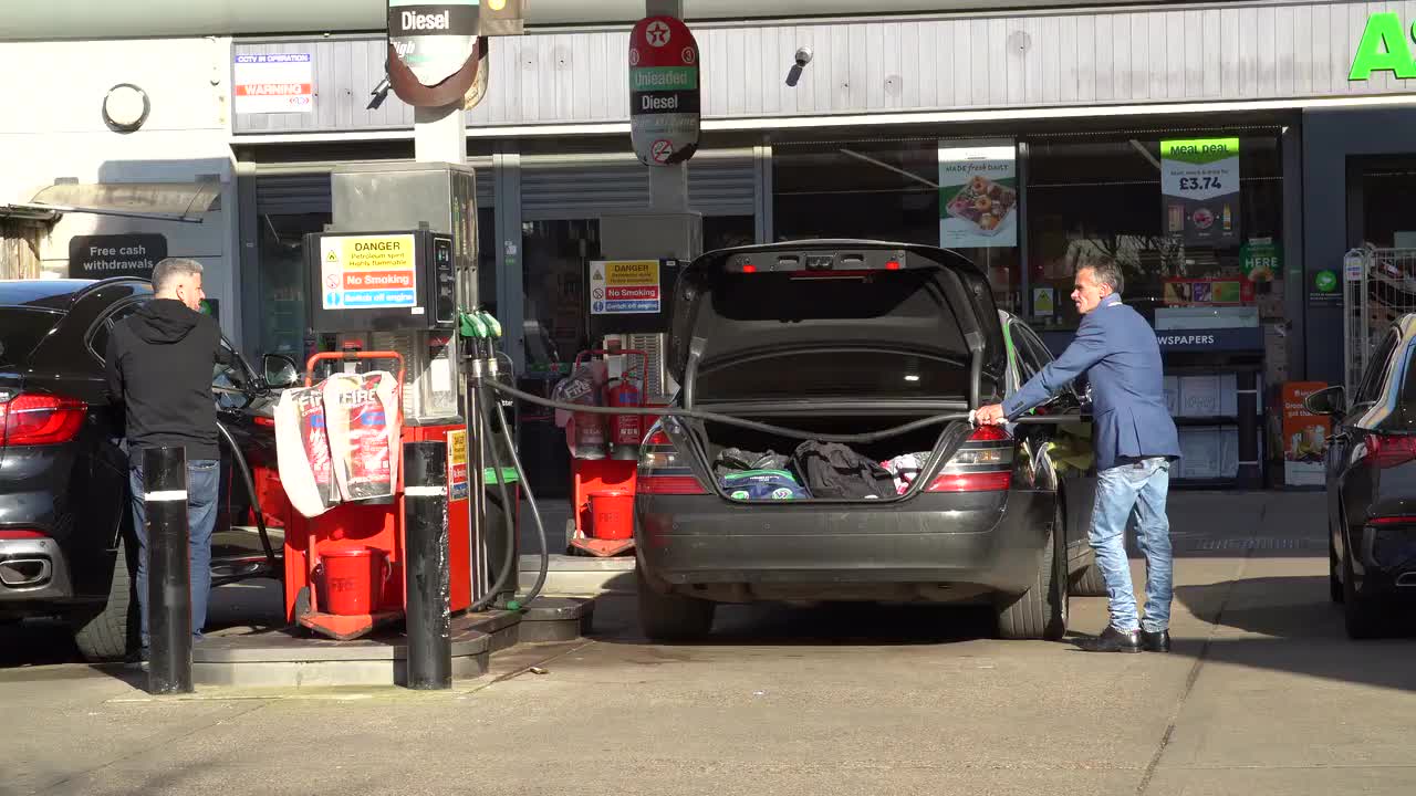 Busy ASDA Petrol Station Refueling Scene