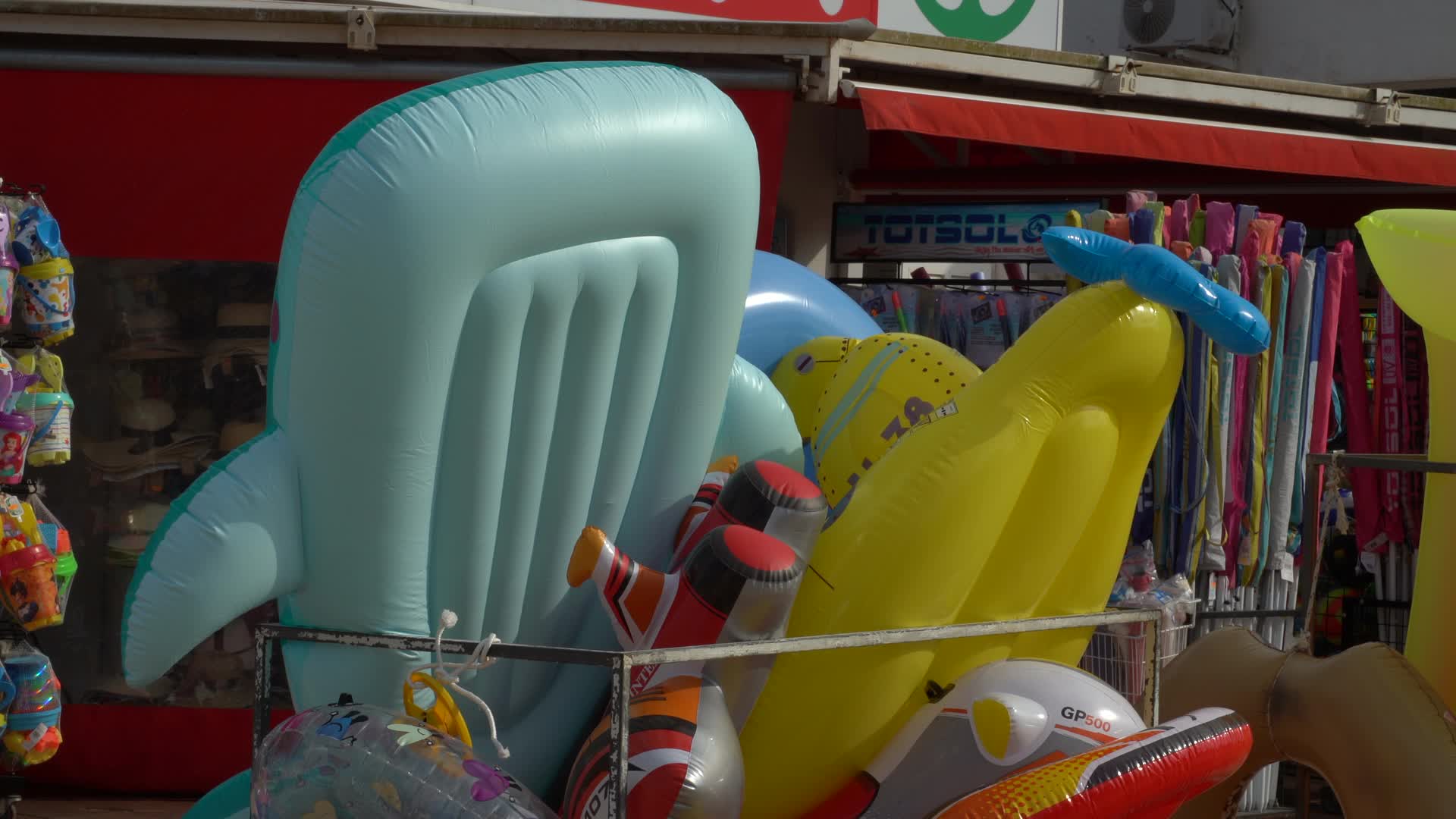 Inflatable Pool Toys Display Outside SPAR Supermarket in Cala d'Or, Mallorca, Spain