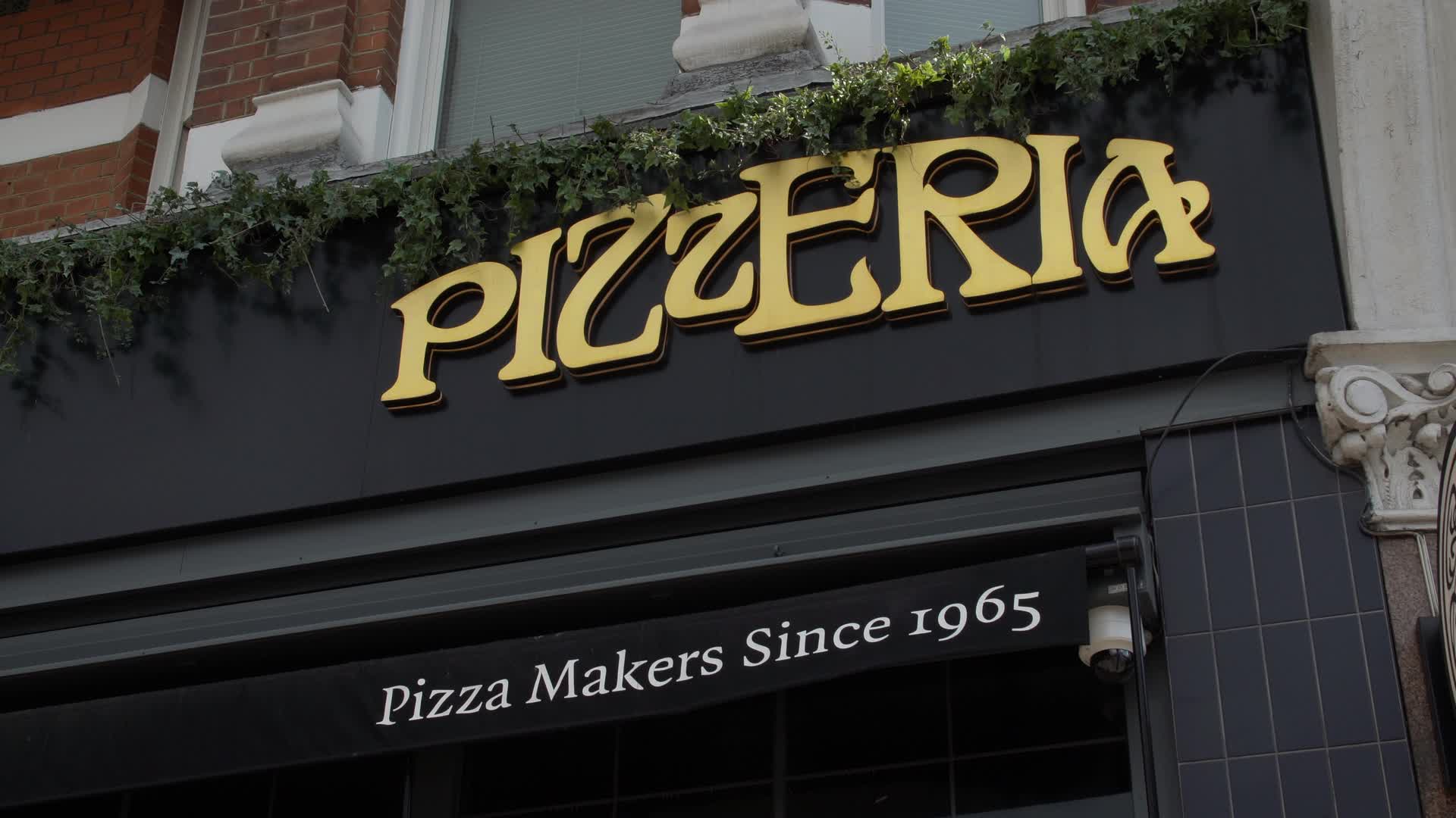 Pizzeria Shopfront with Vintage Signage