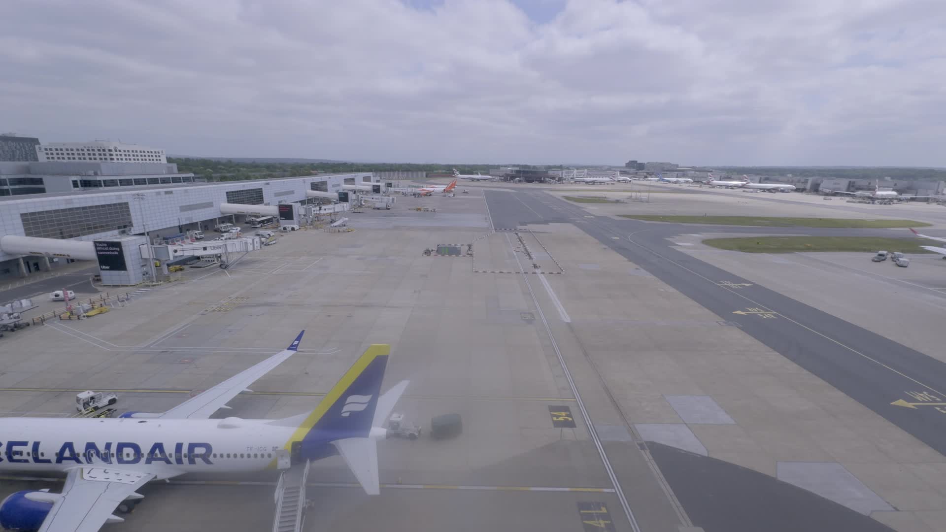 Gulf Airplanes at Busy Airport Terminal