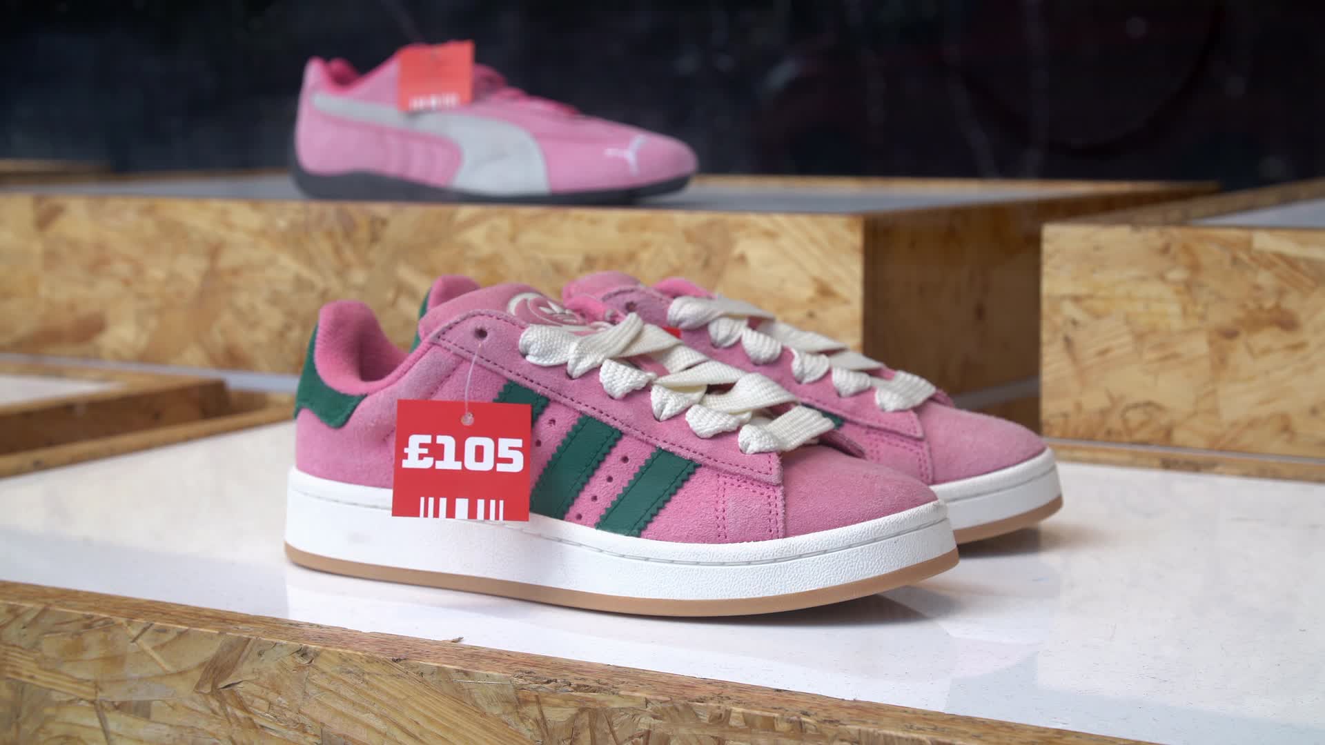 Pink Trainers Display with Price Tag