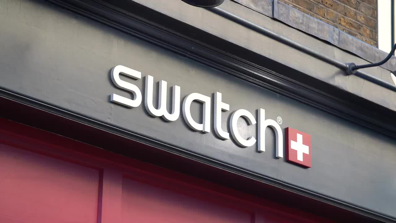 Swatch Storefront Sign in Urban Setting
