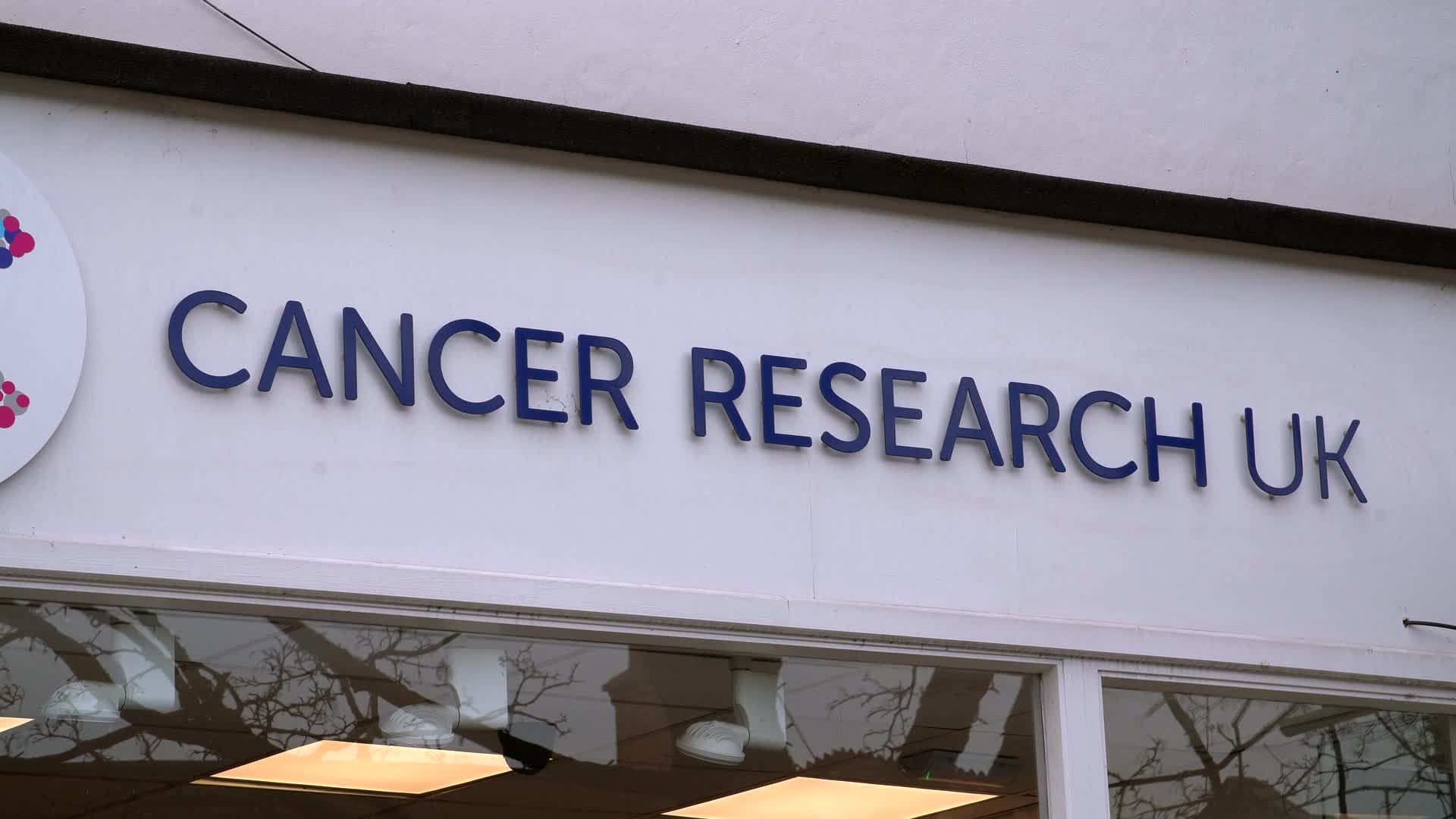Cancer Research UK Storefront Sign in London