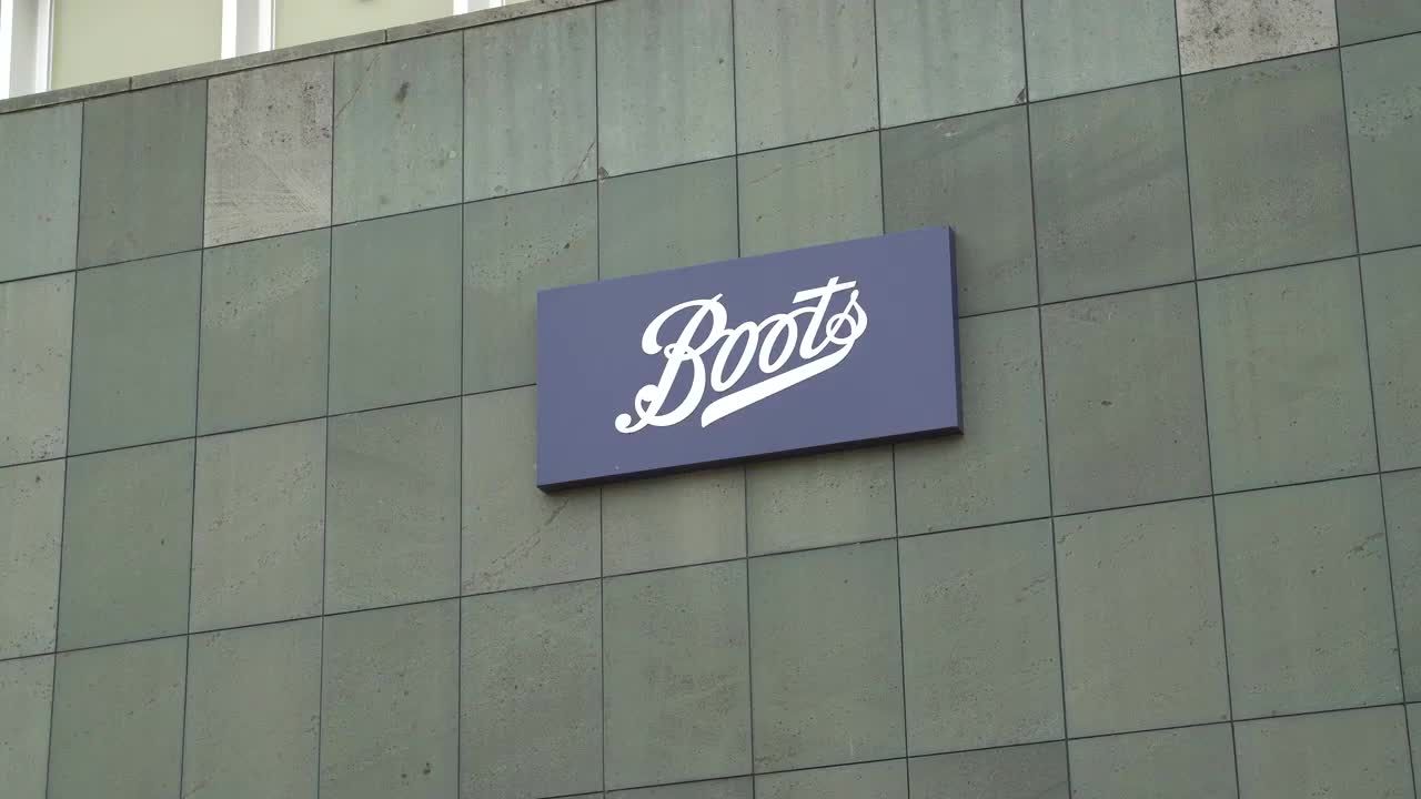 Boots Store Sign on Building