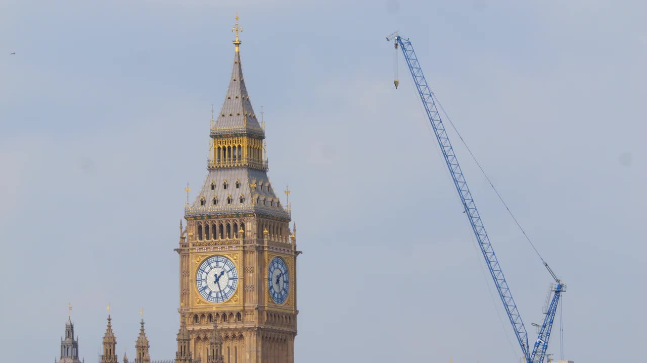 Big Ben and Construction Crane in London