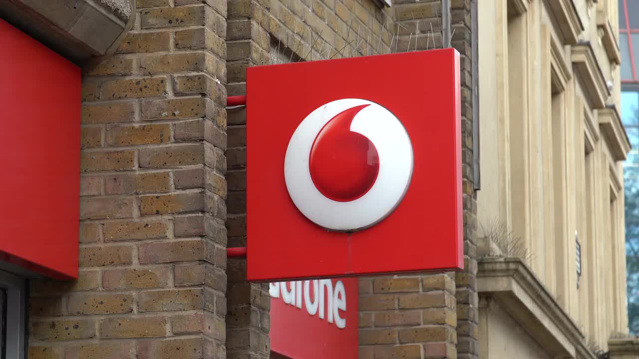 Vodafone Storefront with Logo Signage