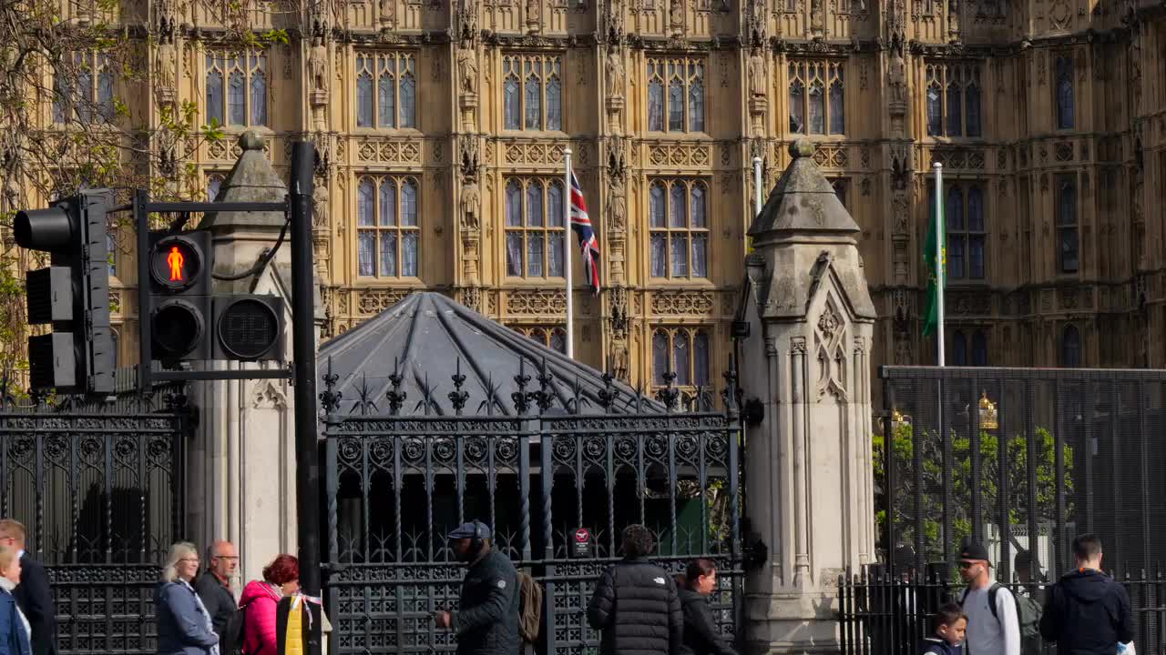 UK Parliament Building Exterior with Pedestrian Traffic